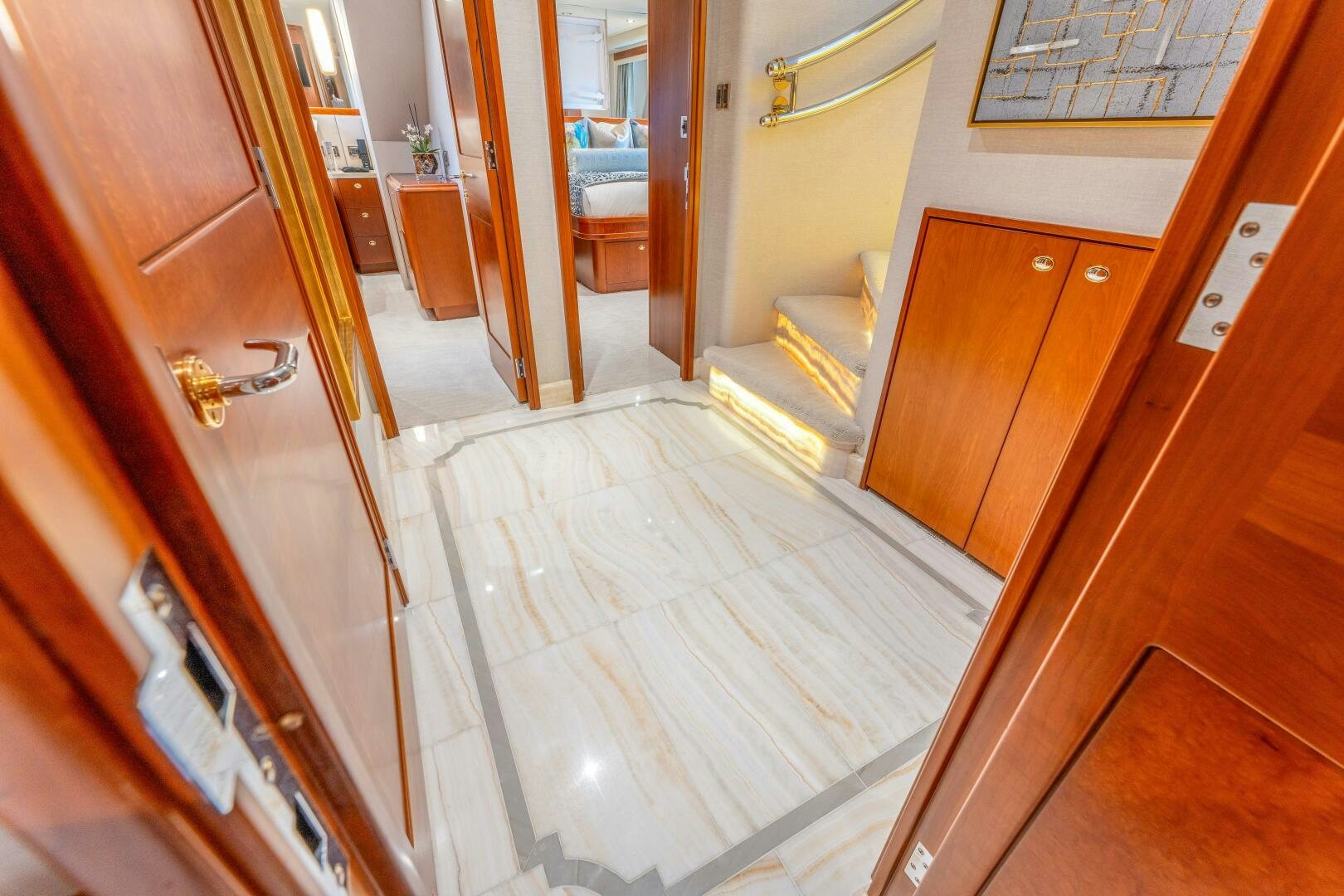 a hallway with a door and a window aboard RELENTLESS Yacht for Sale
