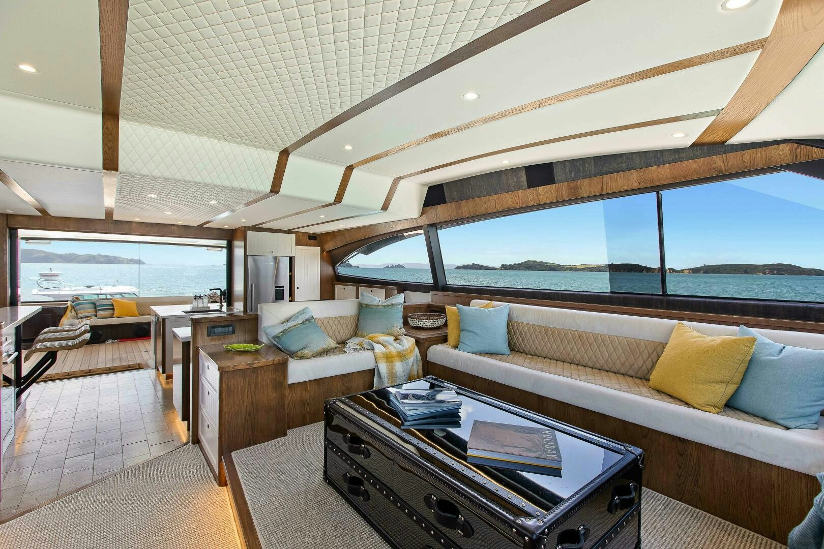 a living room with a large window aboard THE KEYS Yacht for Sale