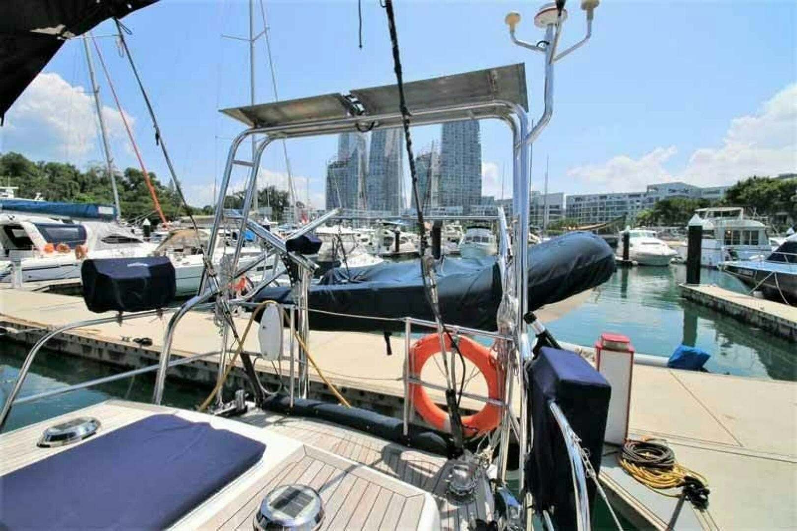 a boat docked at a pier aboard KOKOMO VI Yacht for Sale