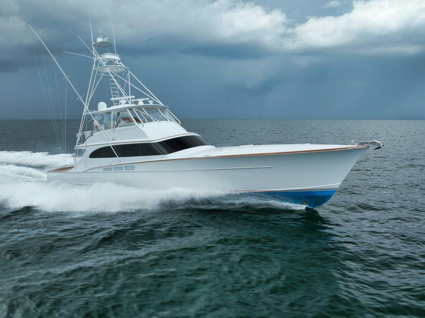 a white boat on the water aboard PERSISTENCE Yacht for Sale
