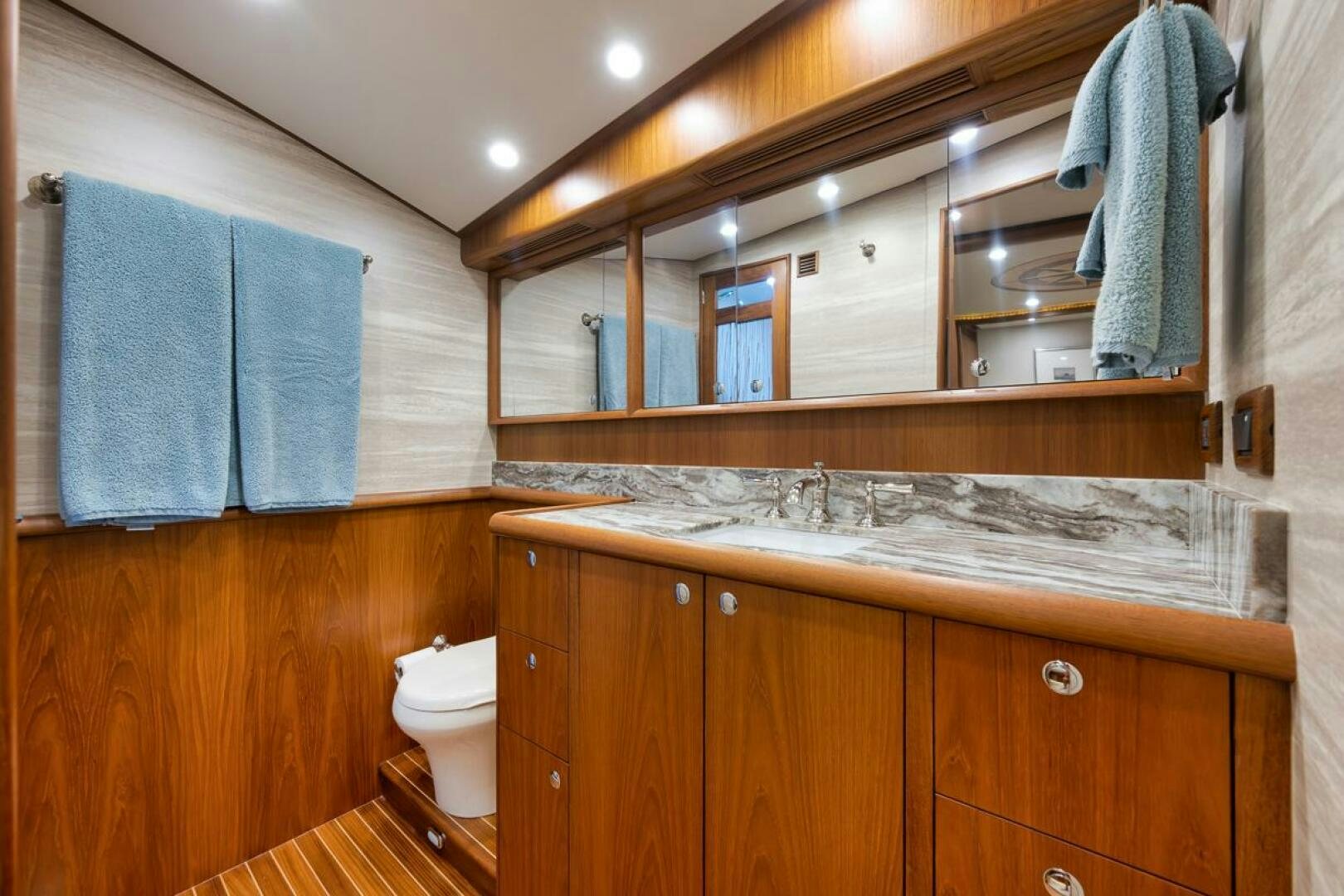 a bathroom with a large mirror aboard PERSISTENCE Yacht for Sale