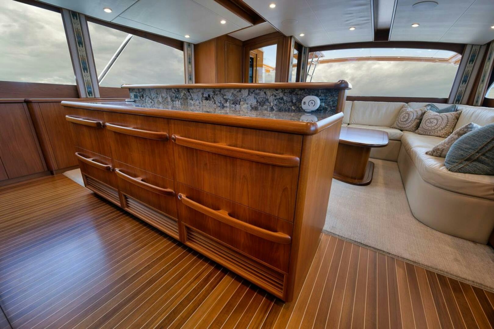 a wood cabinet in a room aboard PERSISTENCE Yacht for Sale