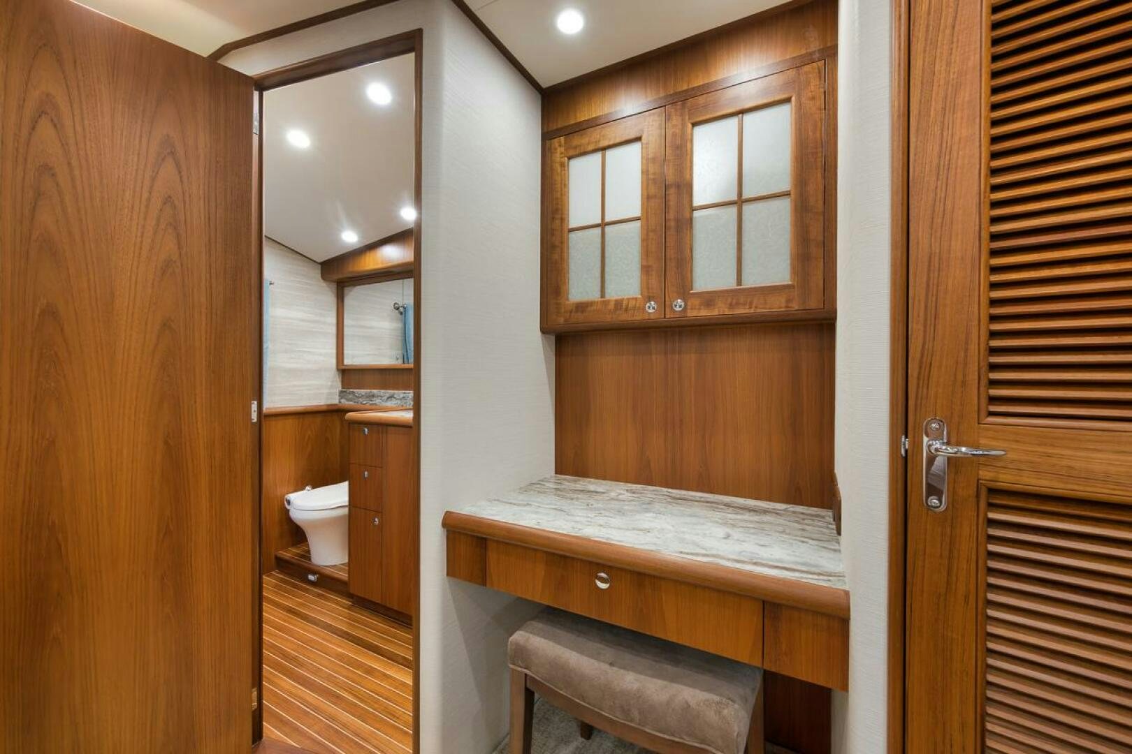 a bathroom with a sink and a toilet aboard PERSISTENCE Yacht for Sale