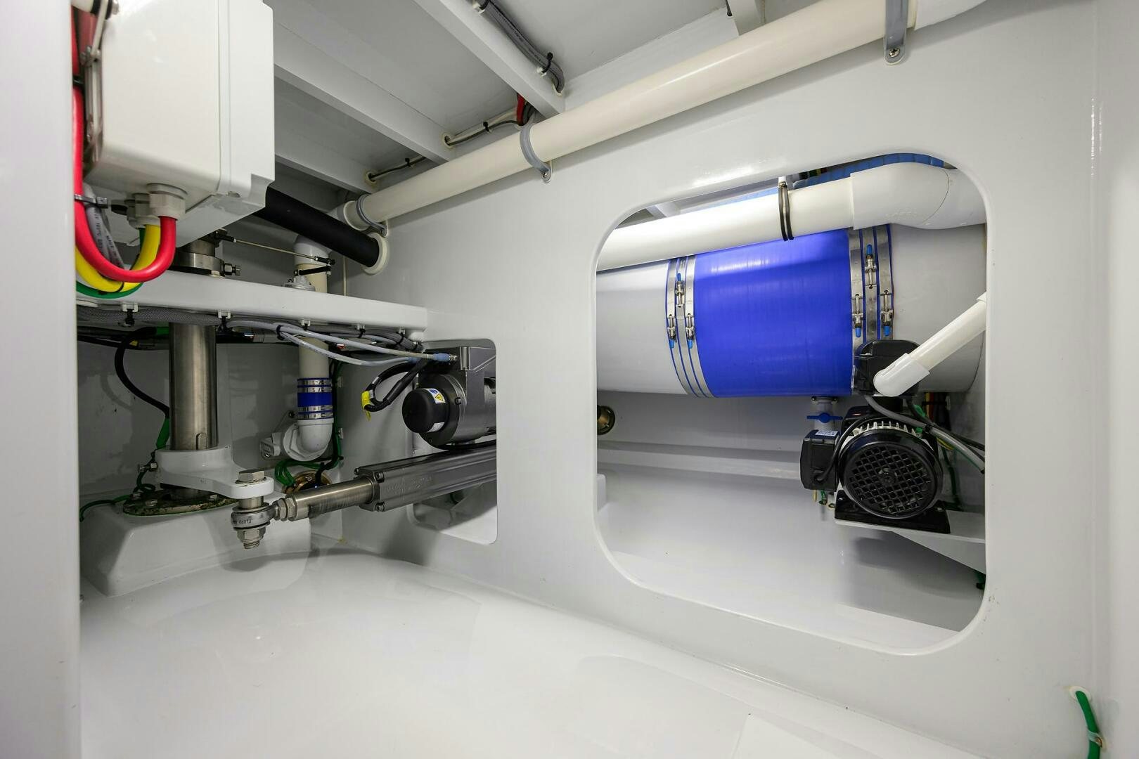 a blue and white tube with a blue tube on a white surface aboard PERSISTENCE Yacht for Sale