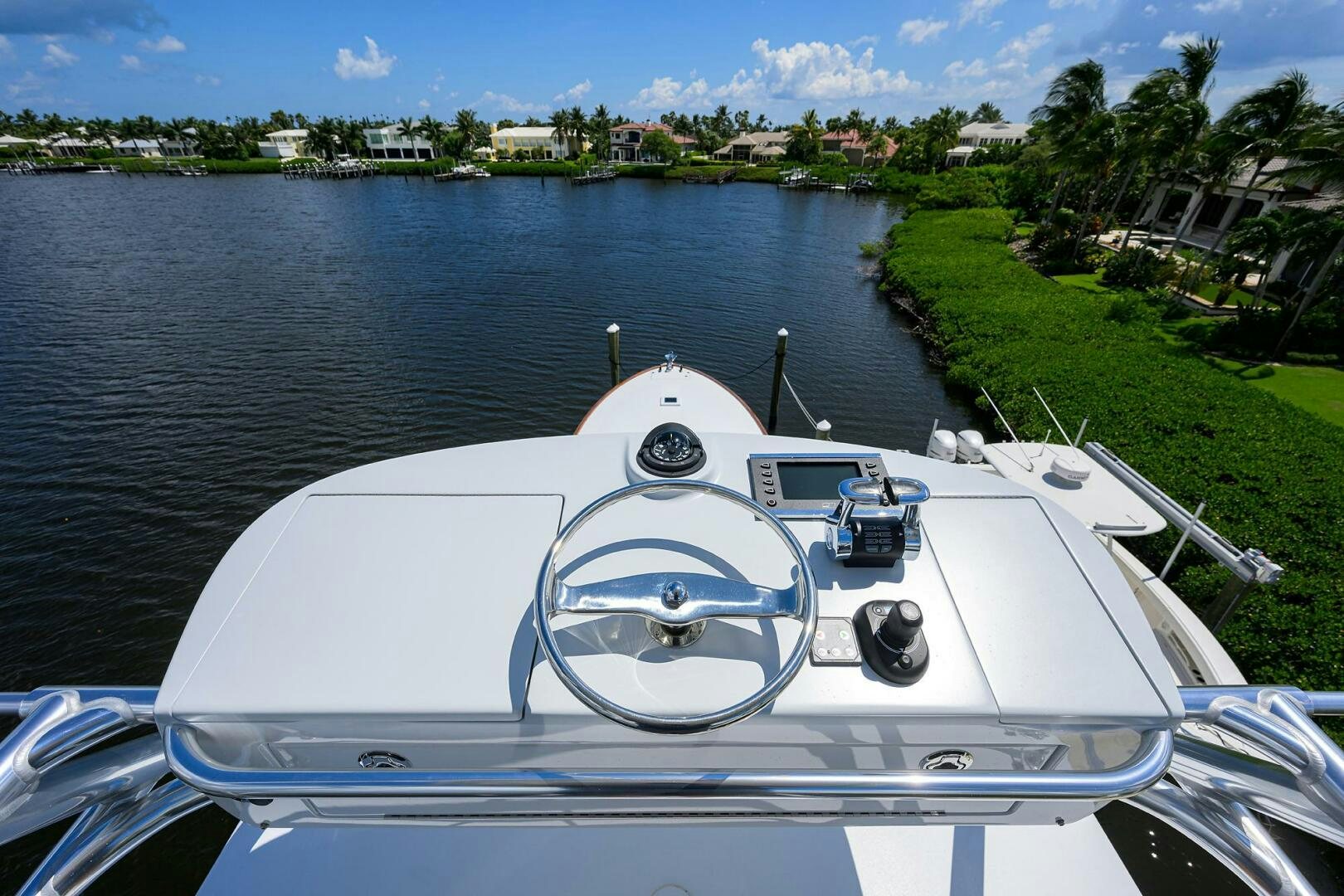 a boat with a steering wheel aboard PERSISTENCE Yacht for Sale