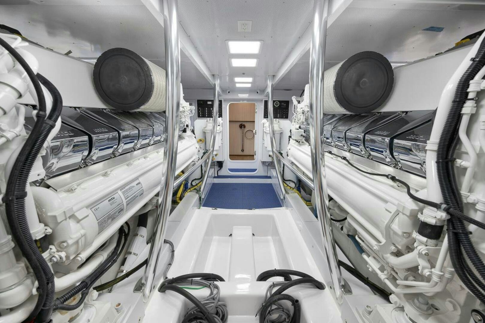 a large room with large speakers aboard PERSISTENCE Yacht for Sale