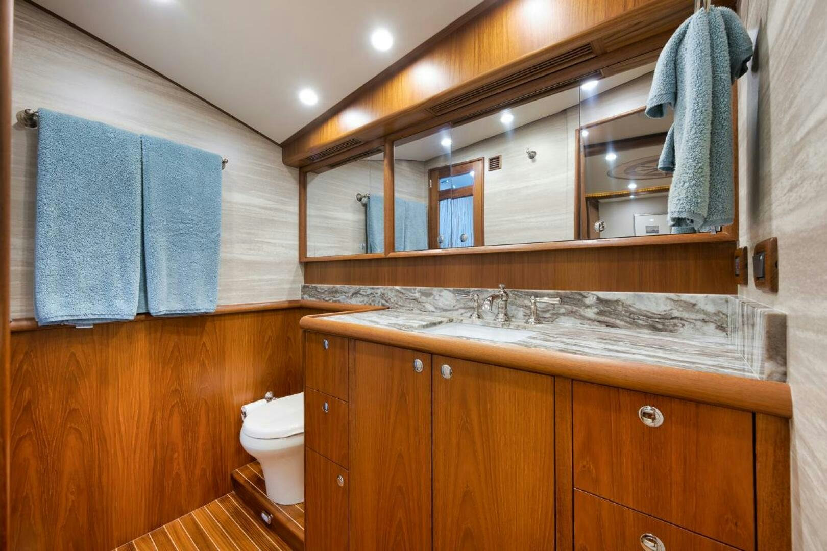 a bathroom with a sink and a mirror aboard PERSISTENCE Yacht for Sale