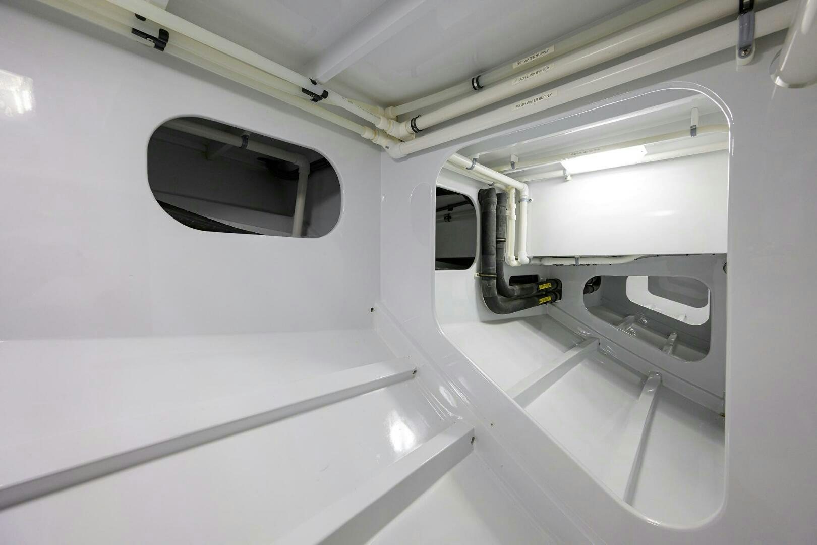 a white vehicle with a black screen aboard PERSISTENCE Yacht for Sale