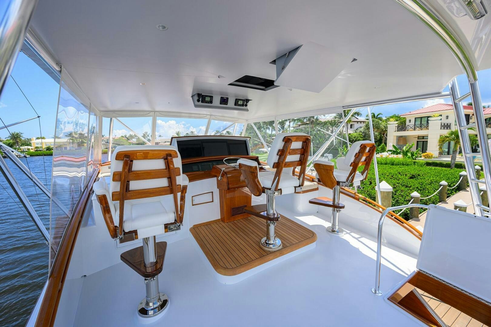 a room with chairs and tables aboard PERSISTENCE Yacht for Sale