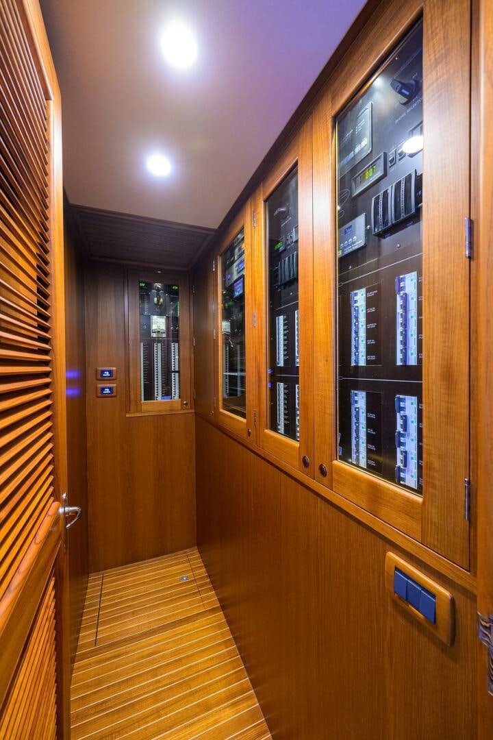 a wood cabinet with a few windows aboard PERSISTENCE Yacht for Sale