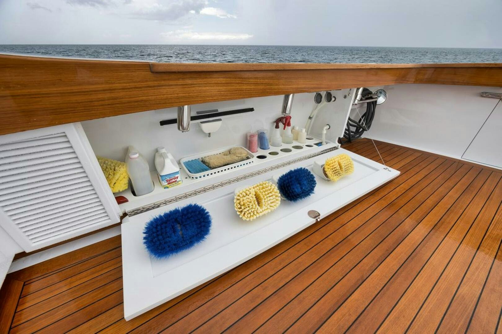 a kitchen counter with a sink and cabinets aboard PERSISTENCE Yacht for Sale