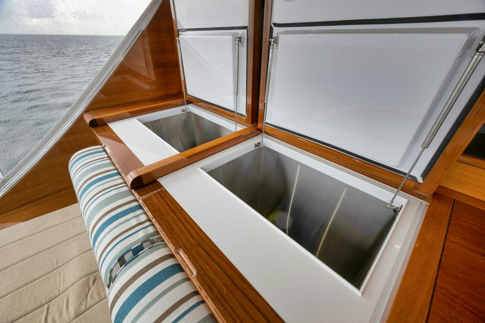 a kitchen with a sink and cabinets aboard PERSISTENCE Yacht for Sale