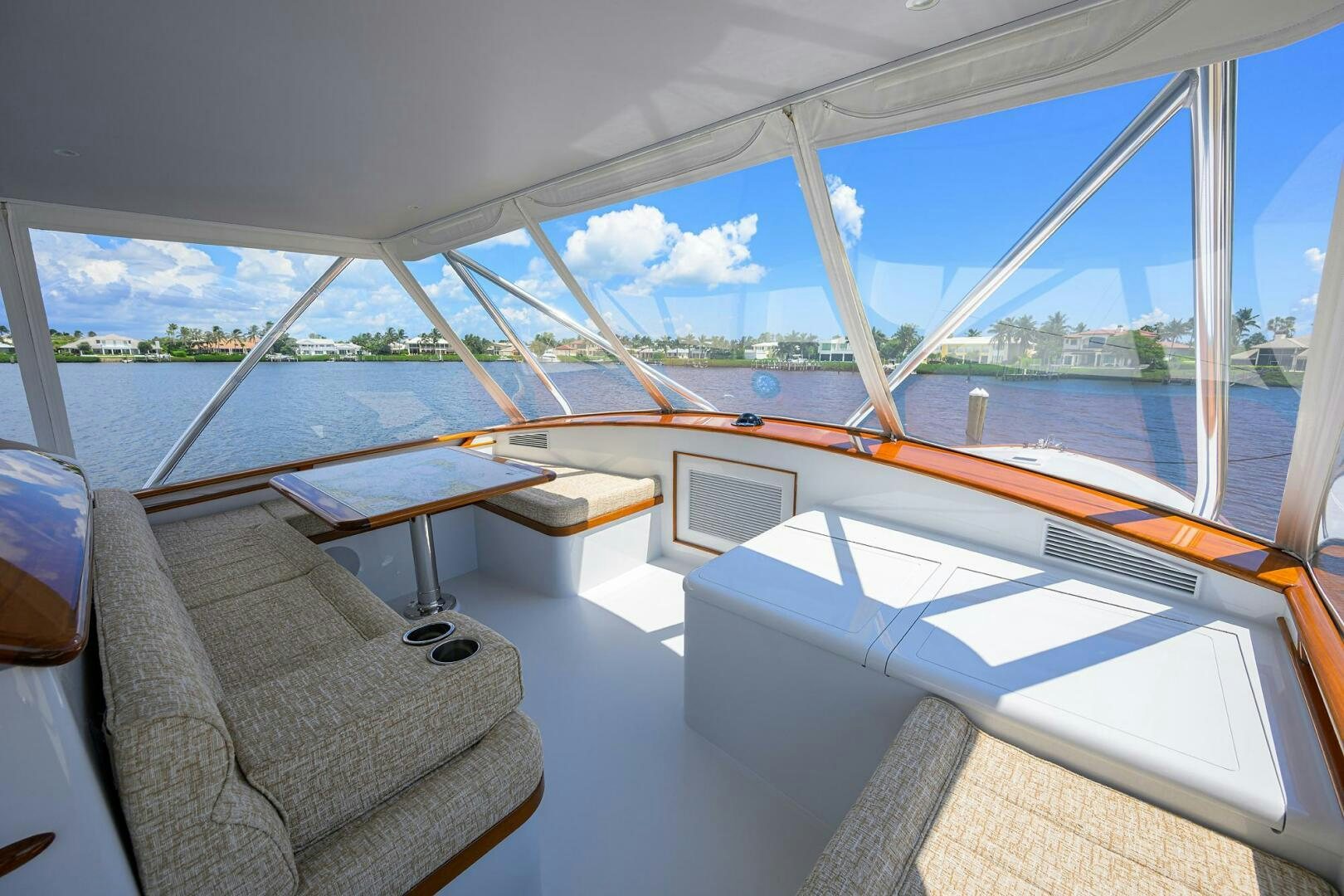 a room with a view of the water and the land below aboard PERSISTENCE Yacht for Sale