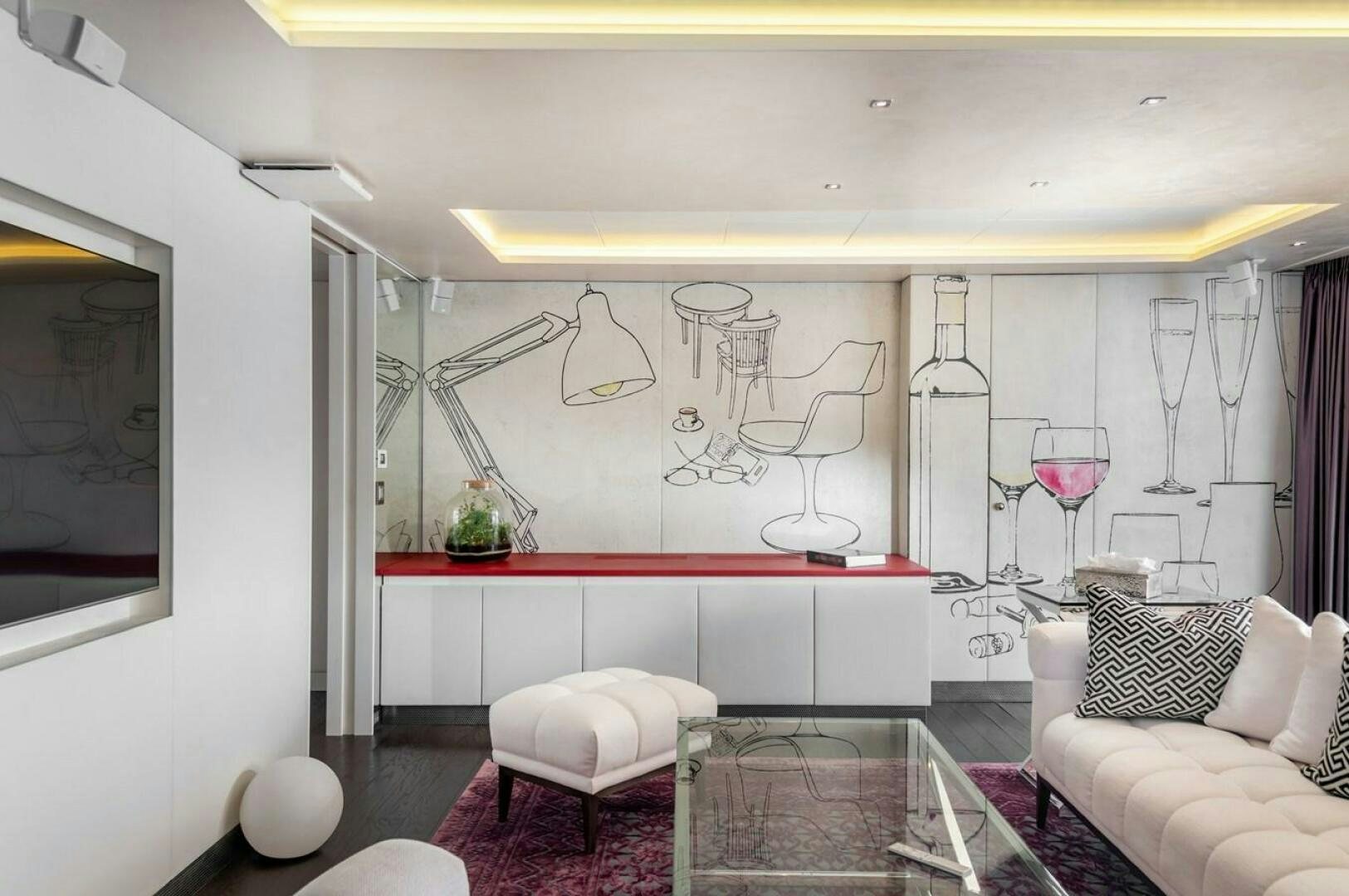 a room with a table and chairs aboard JOY ME Yacht for Sale