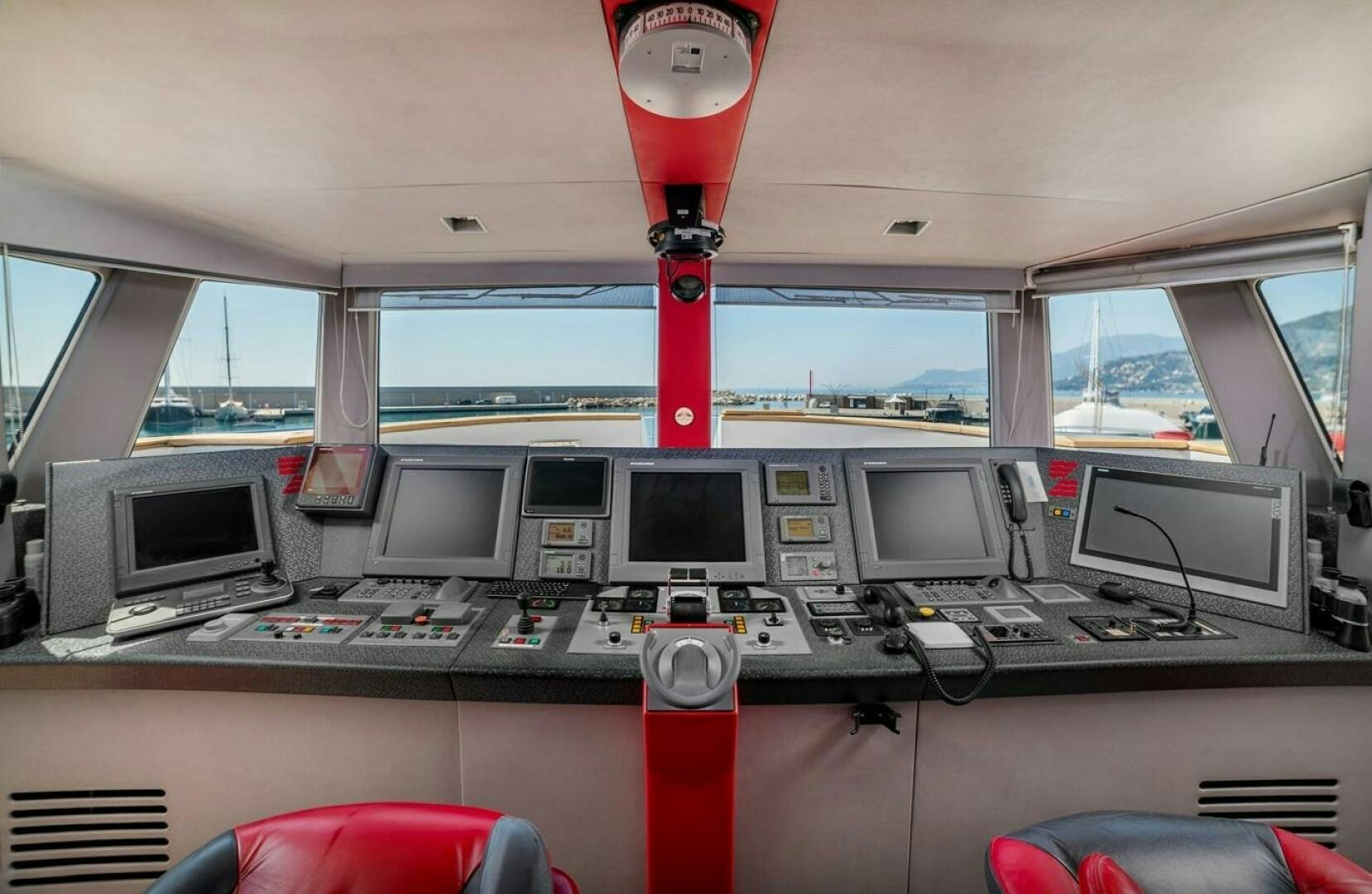 a control room with many computers aboard JOY ME Yacht for Sale
