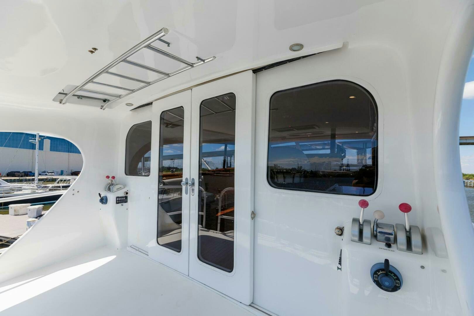 a white vehicle with doors aboard STRESS RELIEFF  Yacht for Sale