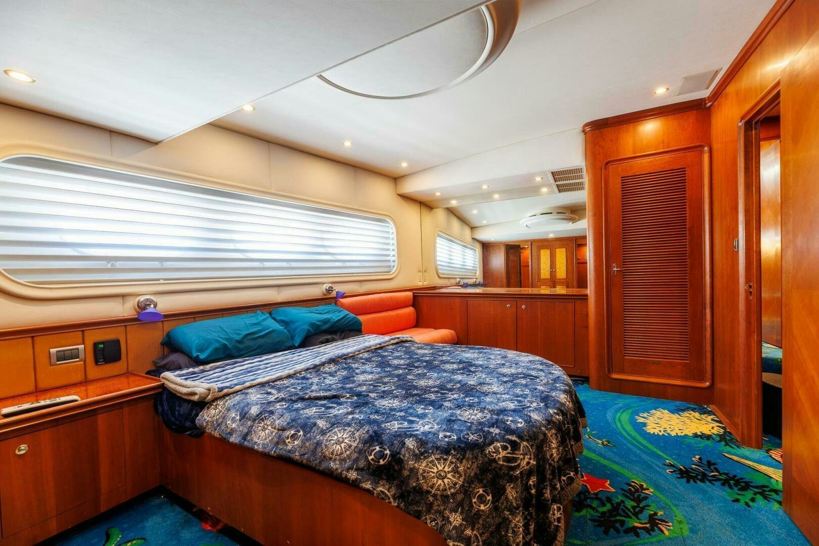 a bedroom with a bed aboard STRESS RELIEFF  Yacht for Sale