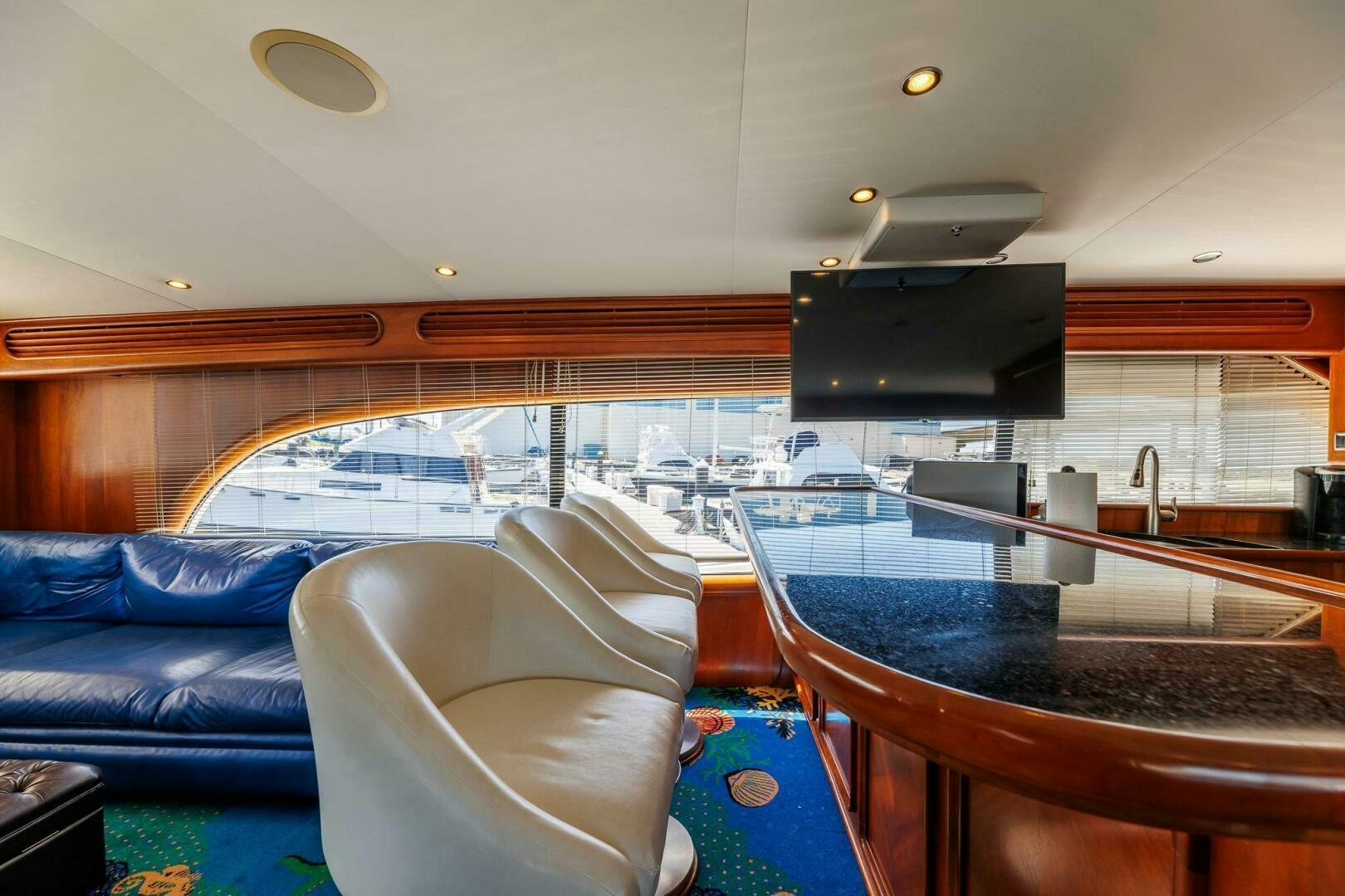 a boat with a chair aboard STRESS RELIEFF  Yacht for Sale