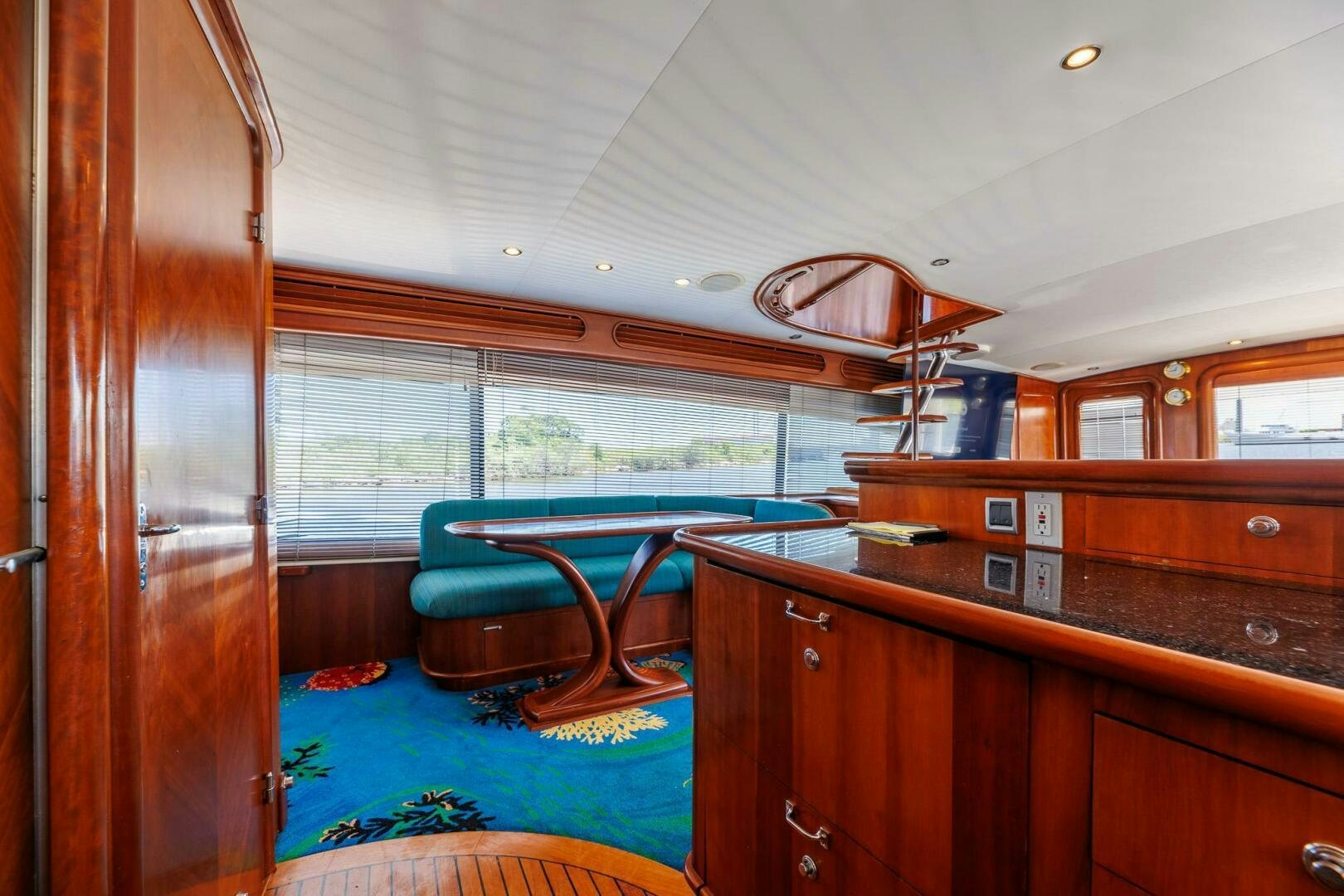 a boat with a chair and a desk in it aboard STRESS RELIEFF  Yacht for Sale