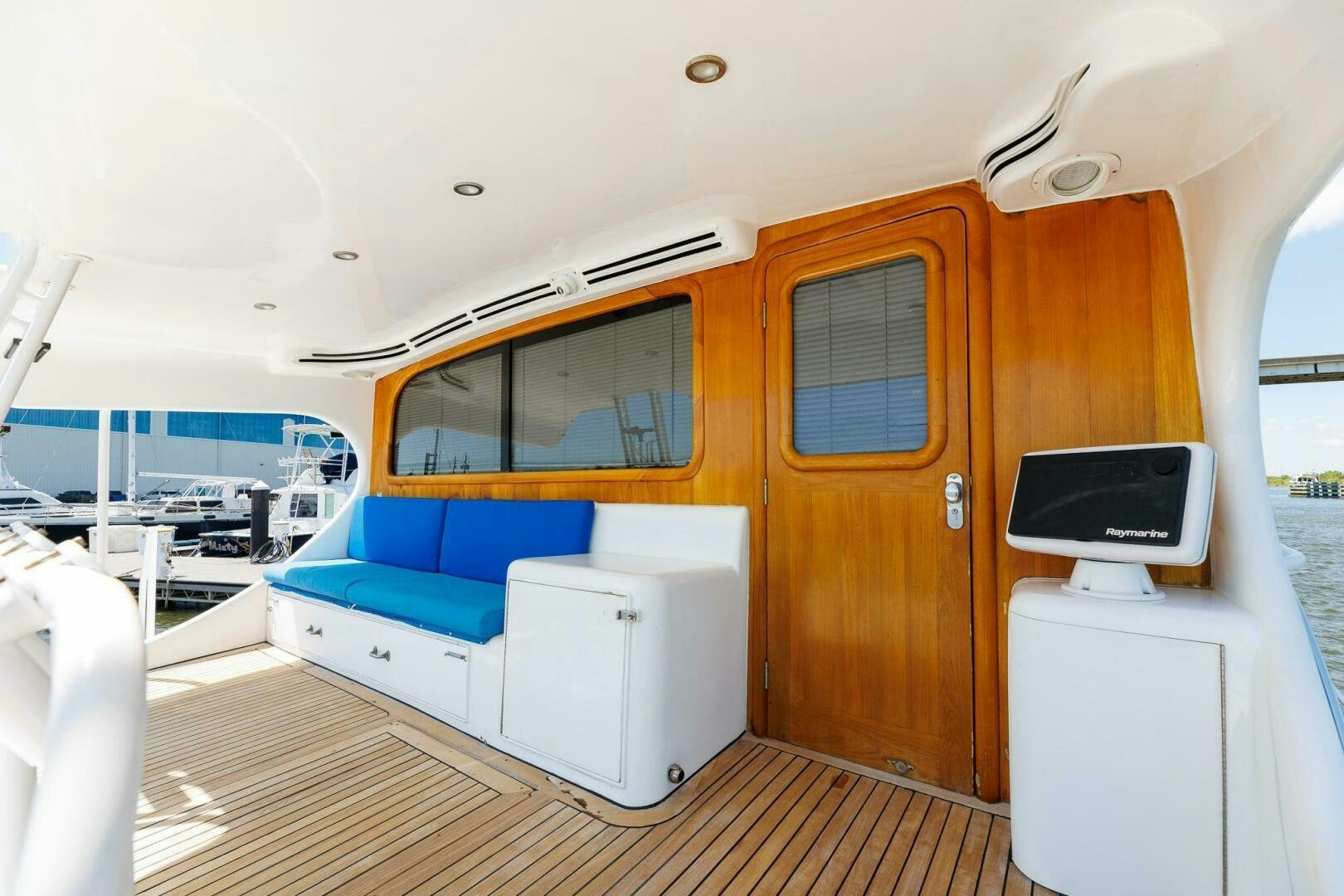 a boat with a laptop on the deck aboard STRESS RELIEFF  Yacht for Sale