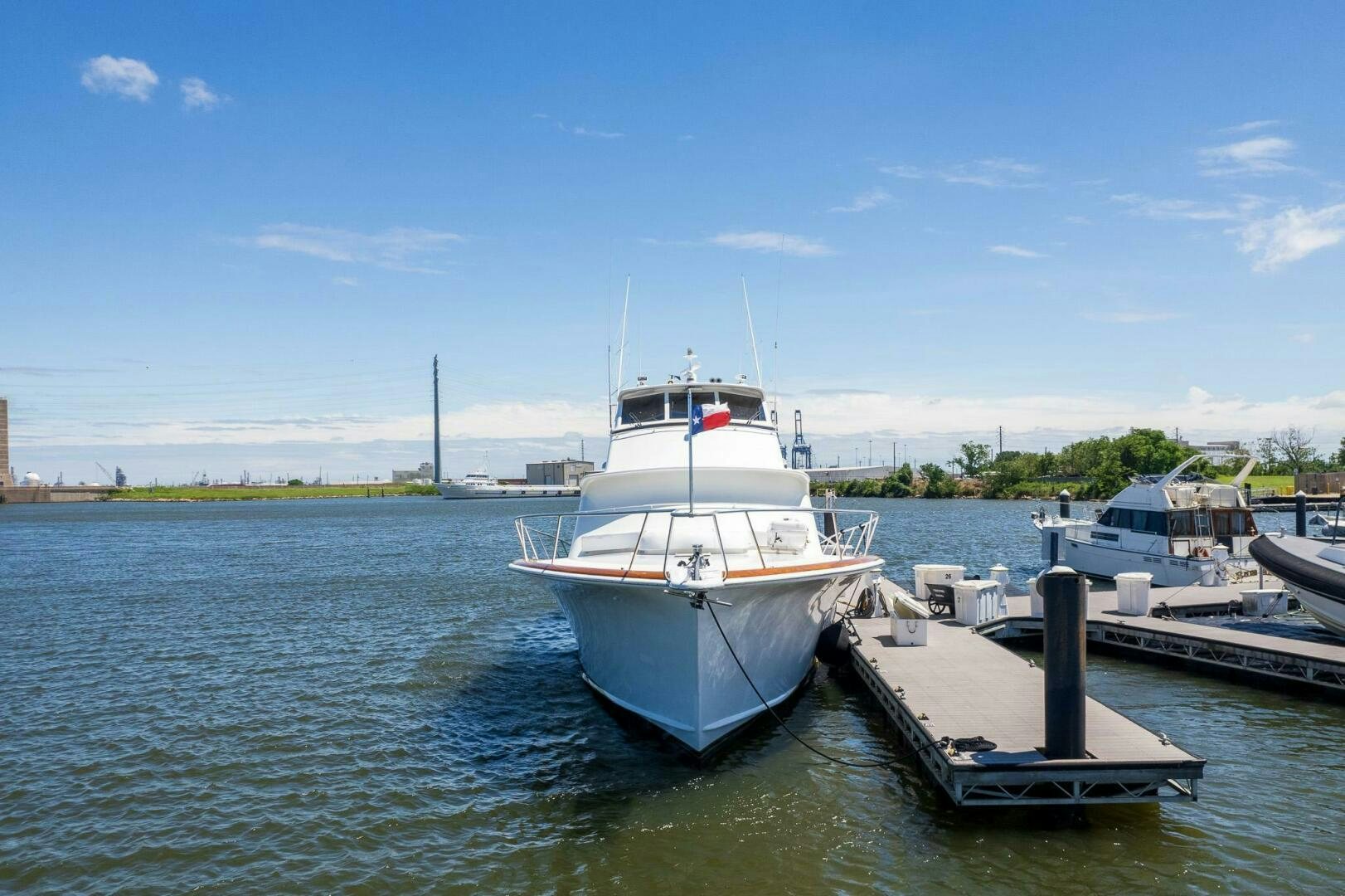 a boat docked at a pier aboard STRESS RELIEFF  Yacht for Sale