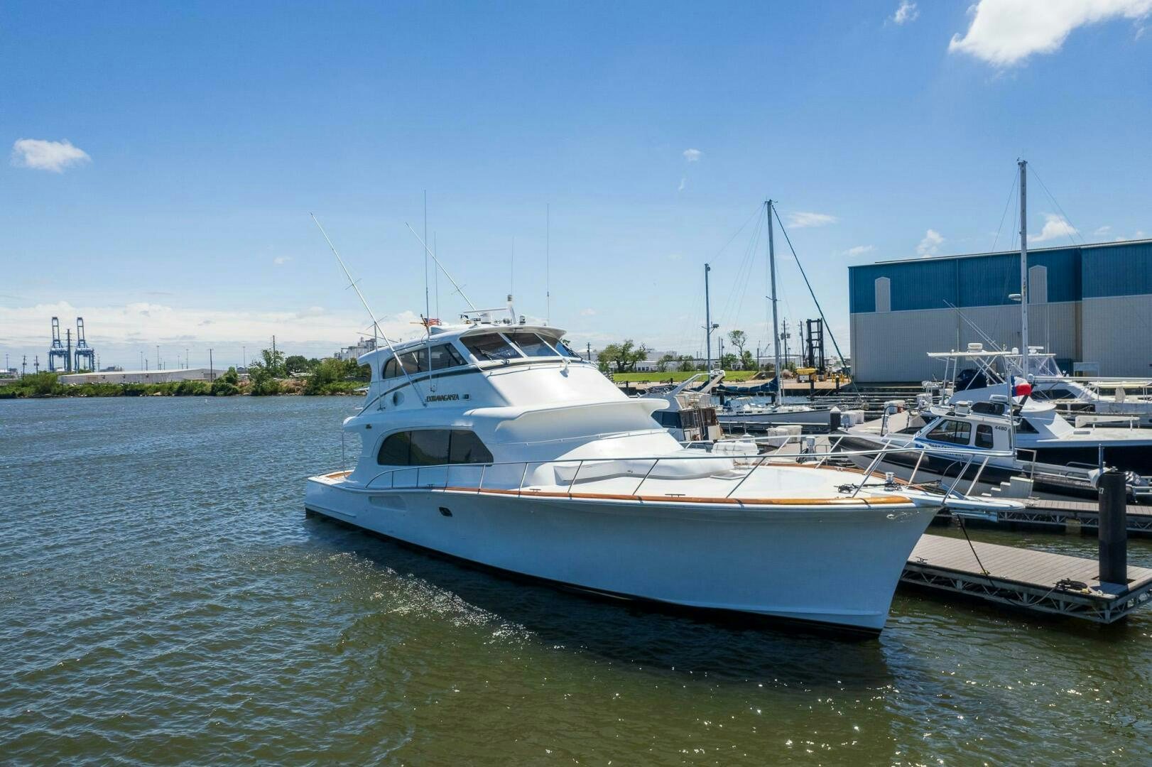 a boat docked at a pier aboard STRESS RELIEFF  Yacht for Sale
