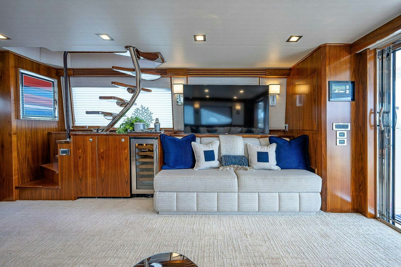 a large living room with a large bed and a tv aboard 75 TRADE Yacht for Sale