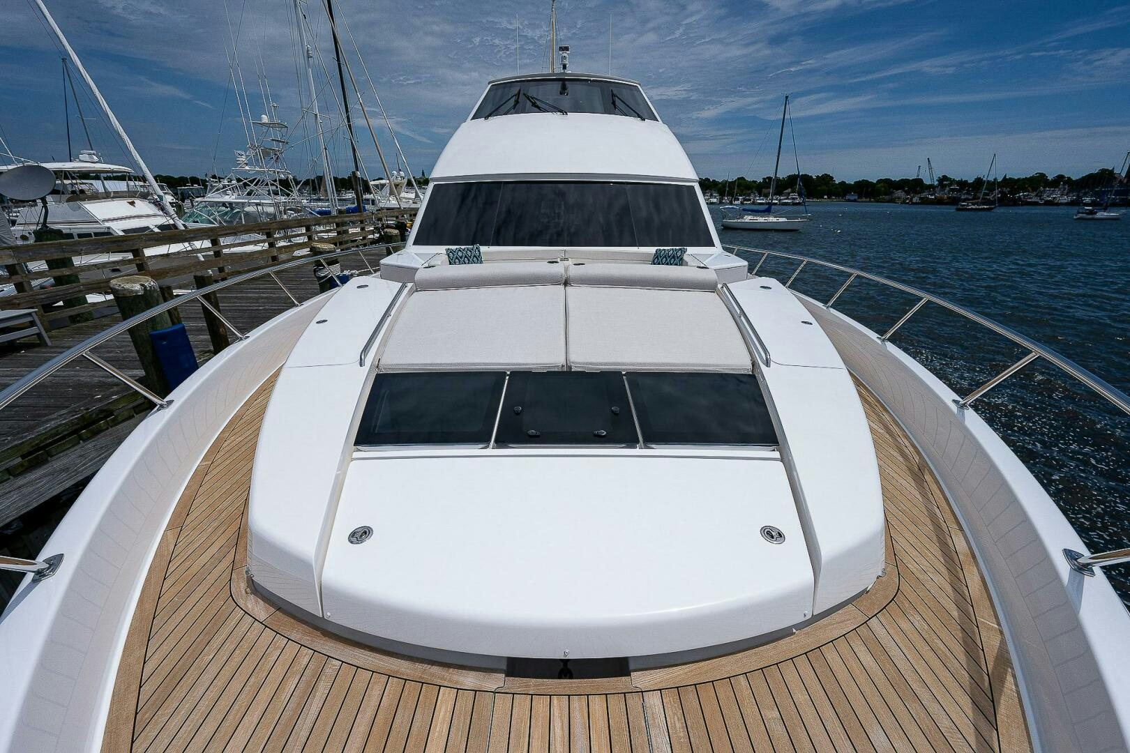 a white yacht on a deck aboard 75 TRADE Yacht for Sale