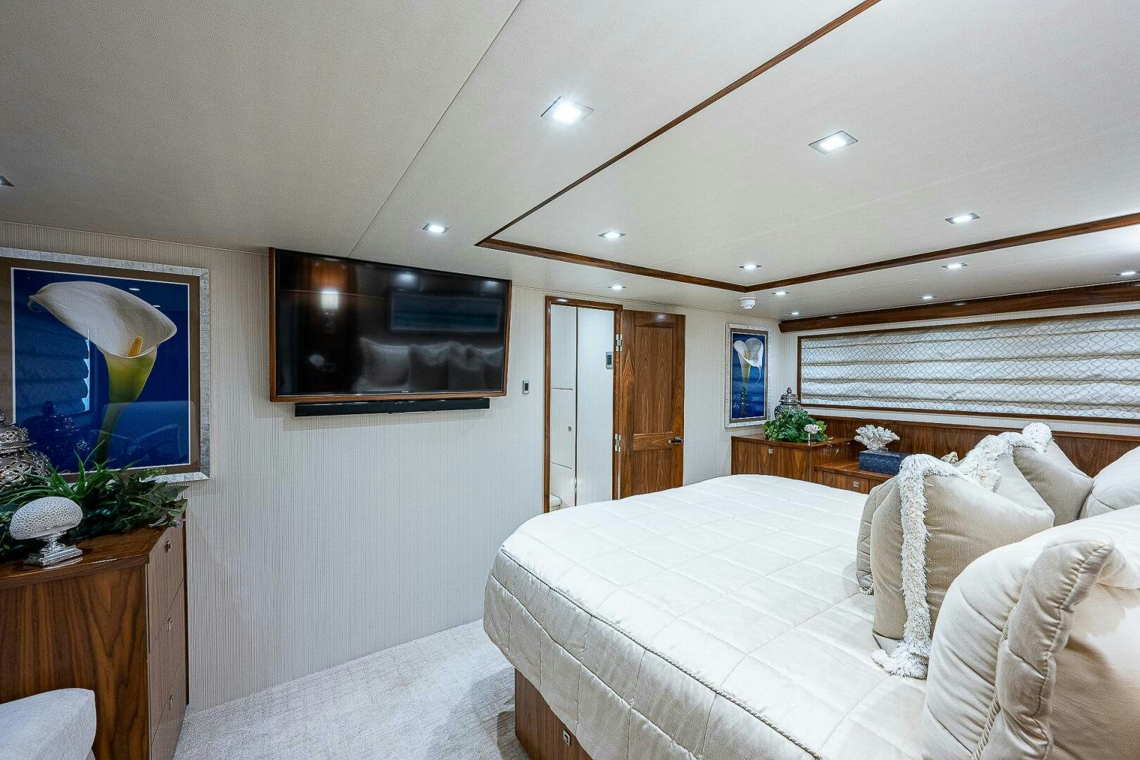 a bedroom with a large bed aboard 75 TRADE Yacht for Sale