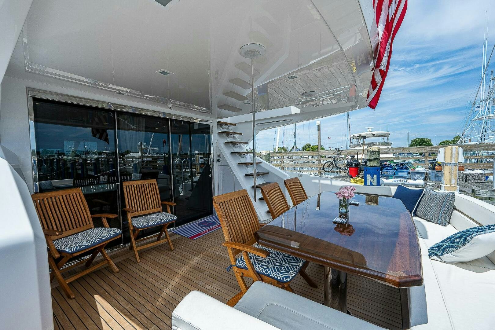 a large boat with a table and chairs on it aboard 75 TRADE Yacht for Sale