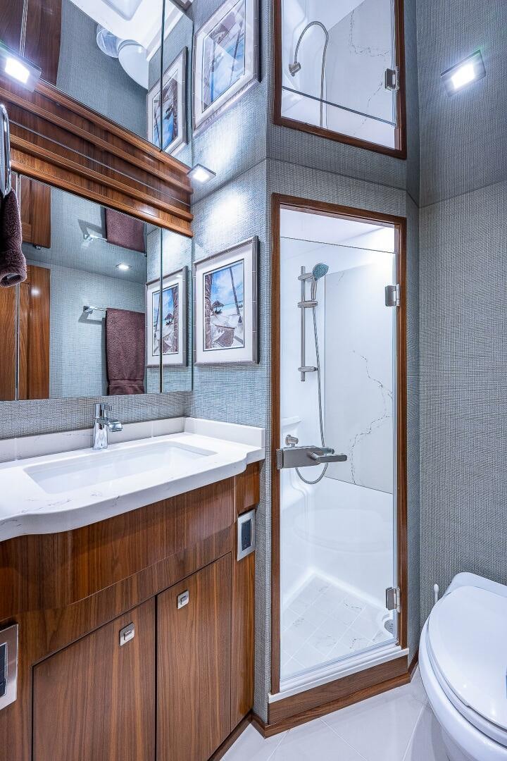 a bathroom with a standup shower aboard 75 TRADE Yacht for Sale