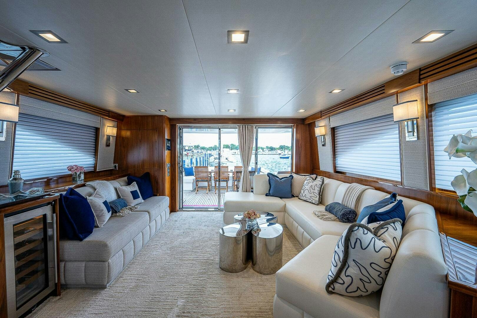 a living room with a couch and a table aboard 75 TRADE Yacht for Sale