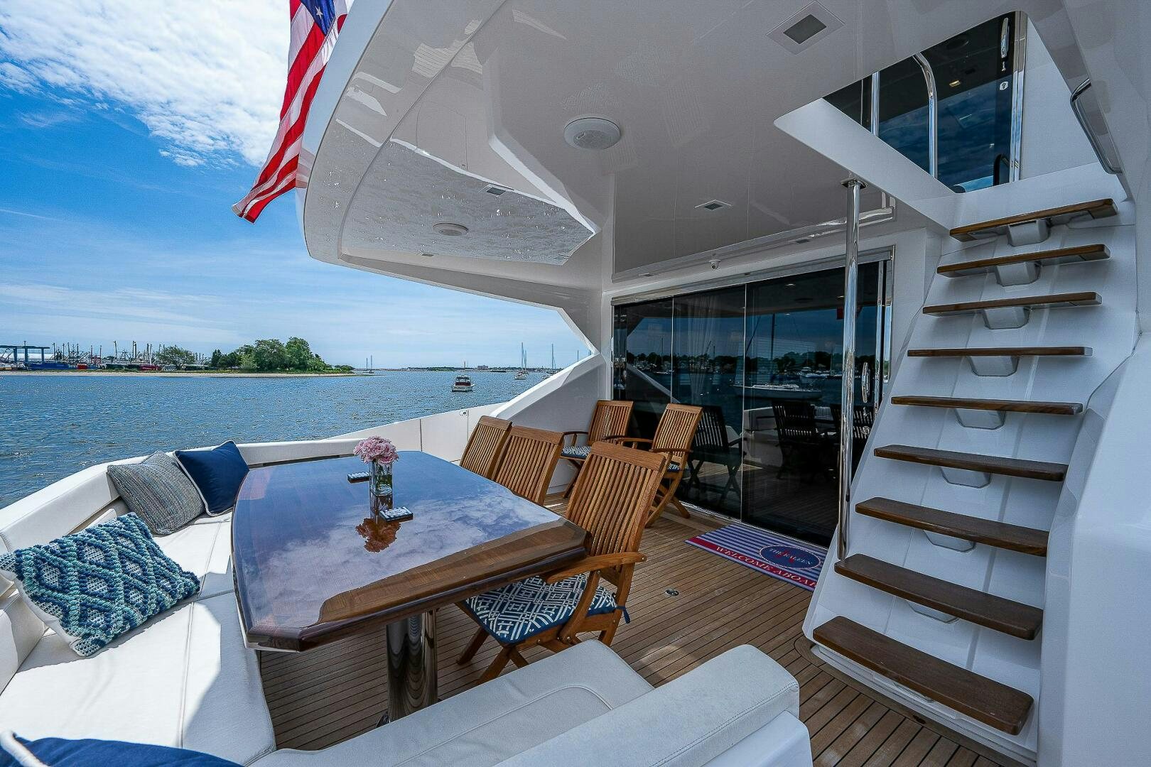 a room with a table and chairs aboard 75 TRADE Yacht for Sale