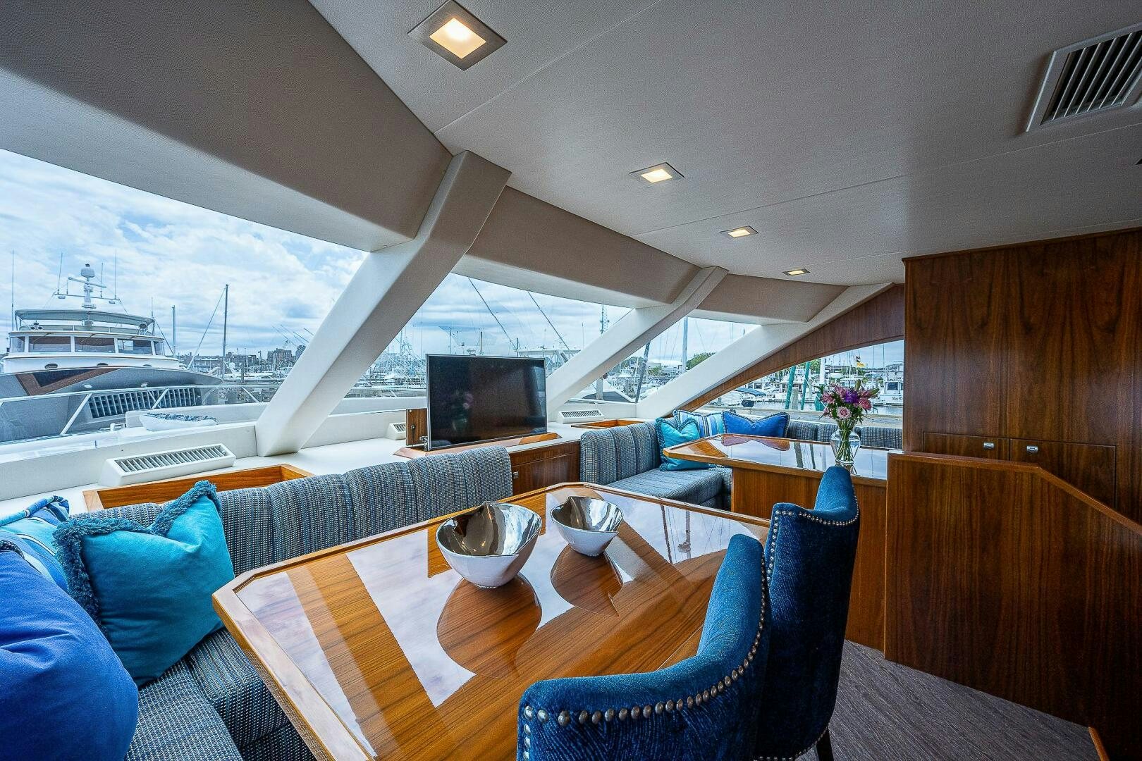 a room with a table and chairs aboard 75 TRADE Yacht for Sale