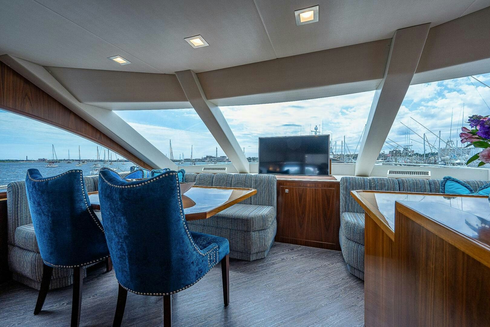 a room with a table and chairs aboard 75 TRADE Yacht for Sale