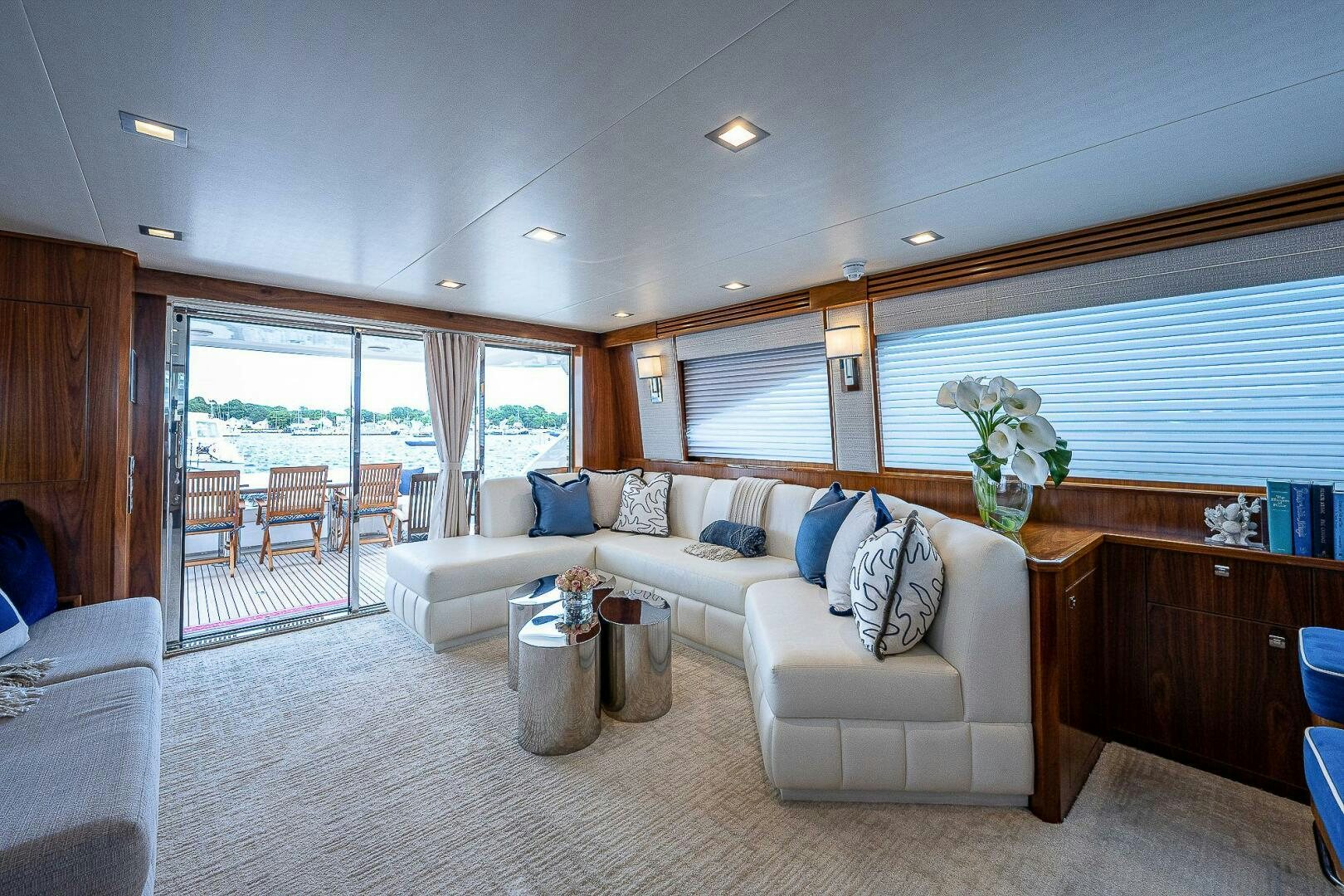 a living room with a large window aboard 75 TRADE Yacht for Sale