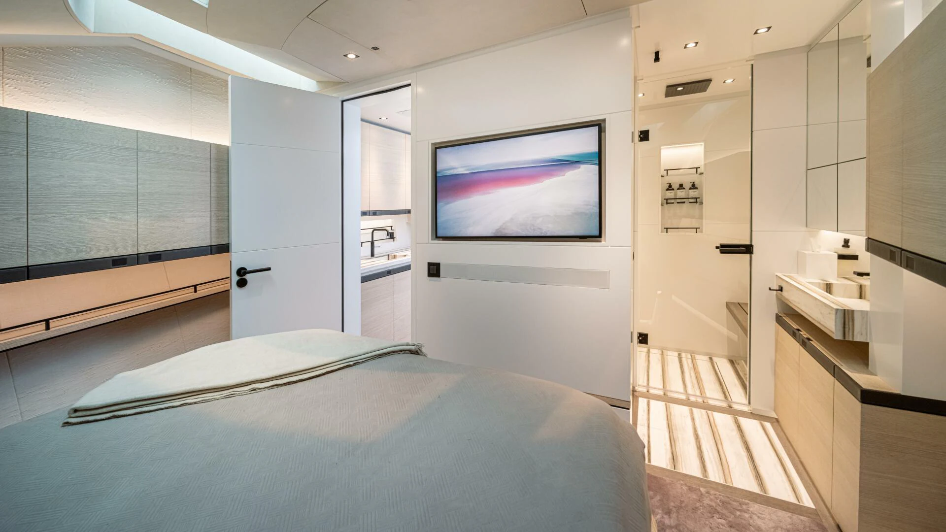 a room with a bed and a tv aboard FELLOWSHIP II Yacht for Sale