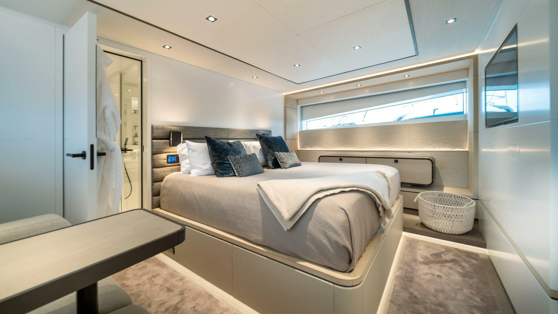 a room with a bed and a desk aboard FELLOWSHIP II Yacht for Sale