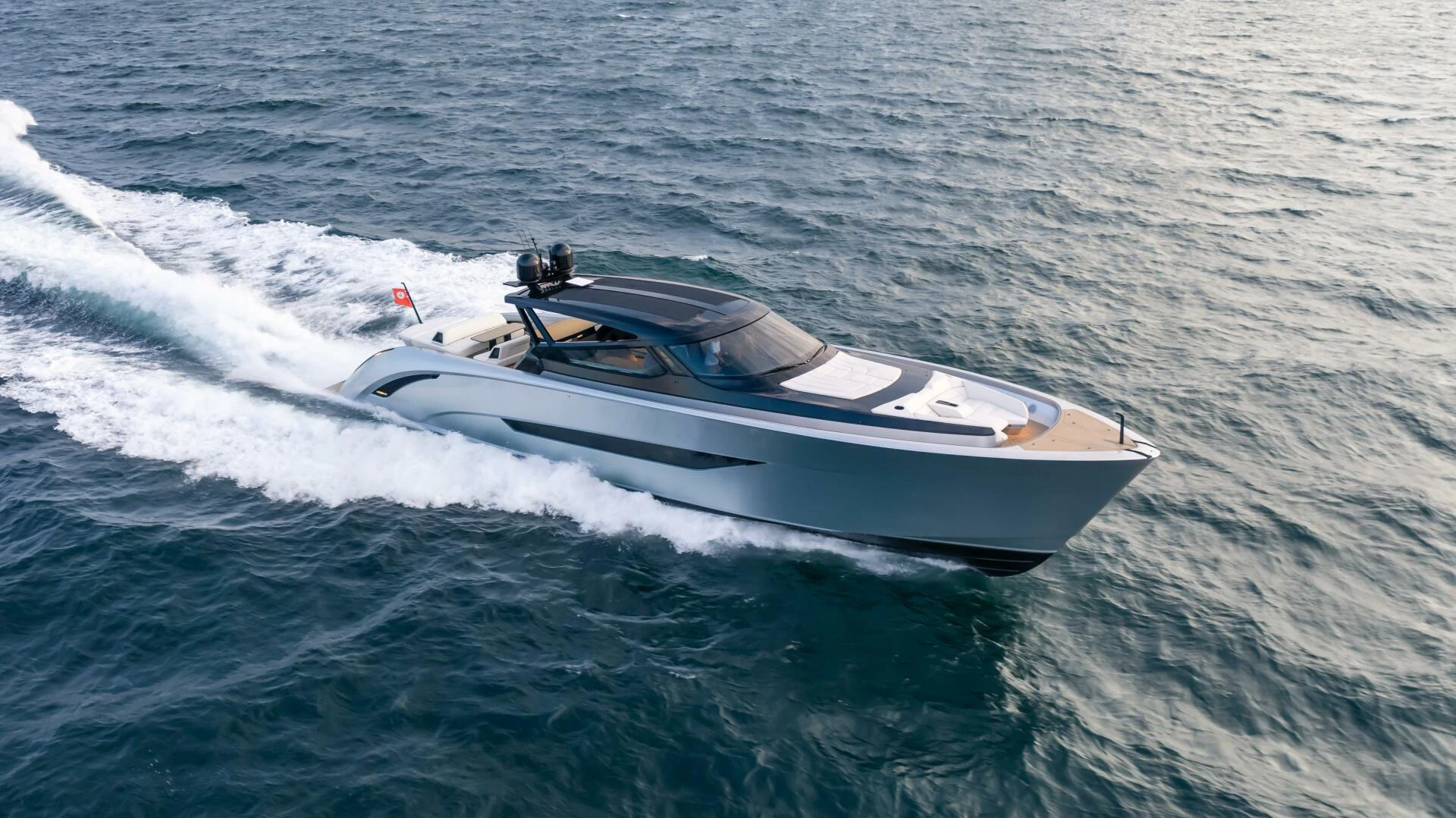 a white boat on the water aboard FELLOWSHIP II Yacht for Sale