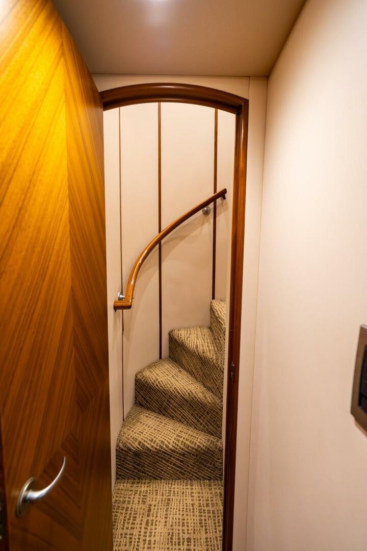 a staircase with a wood frame aboard LITTLE AUDREY Yacht for Sale