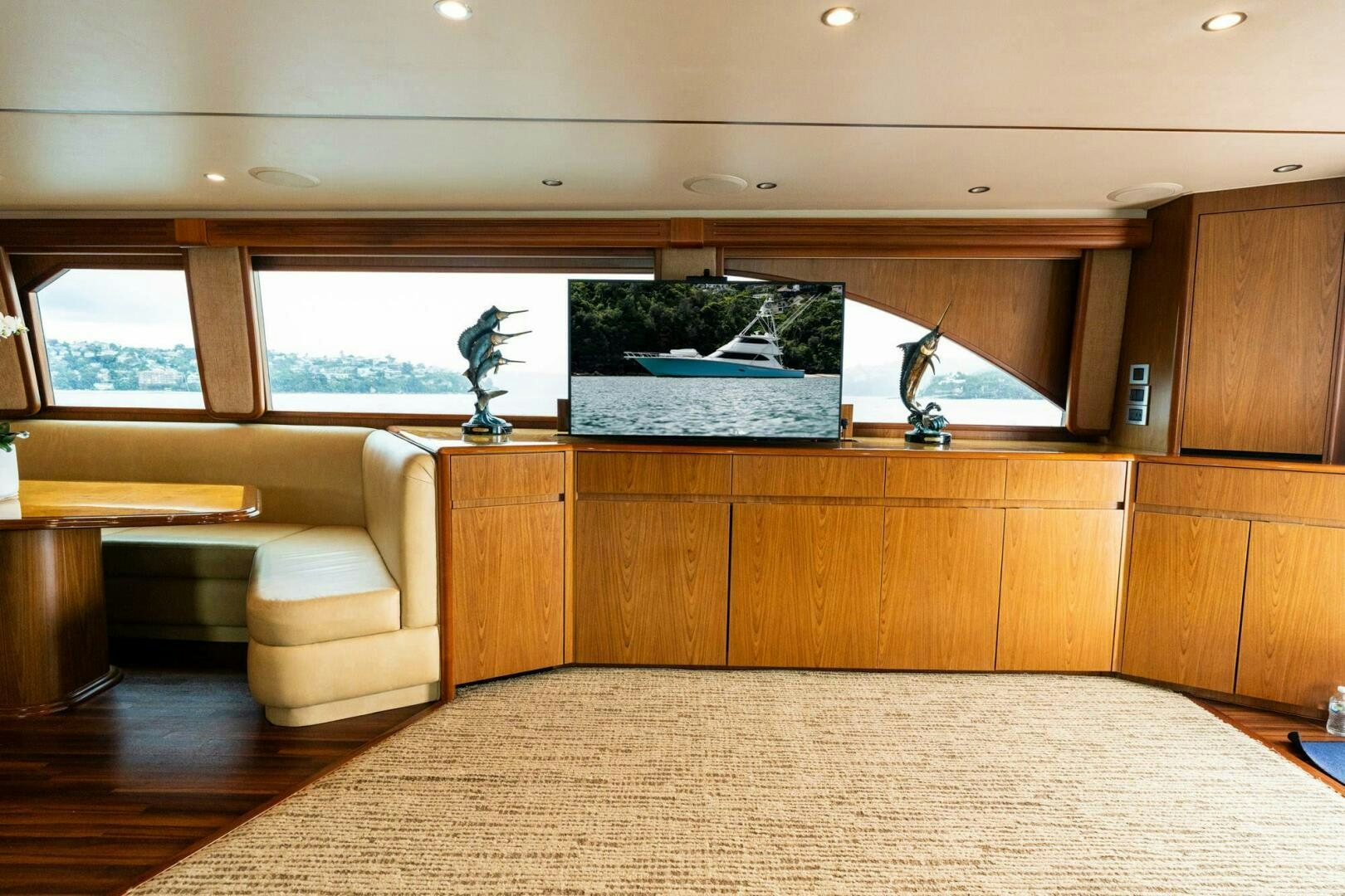 a room with a large mirror and a couch aboard LITTLE AUDREY Yacht for Sale