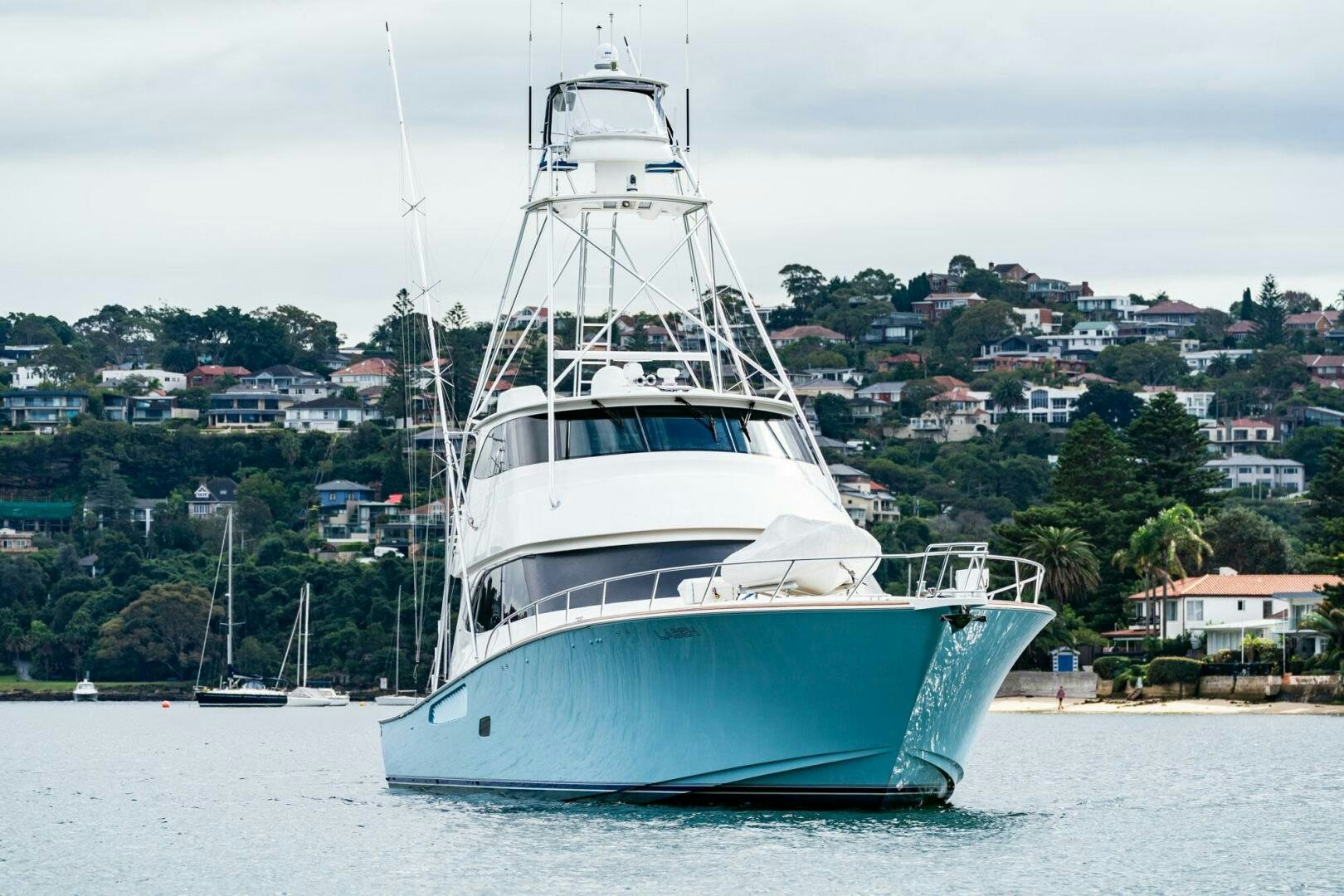 a large white boat in the water aboard LITTLE AUDREY Yacht for Sale