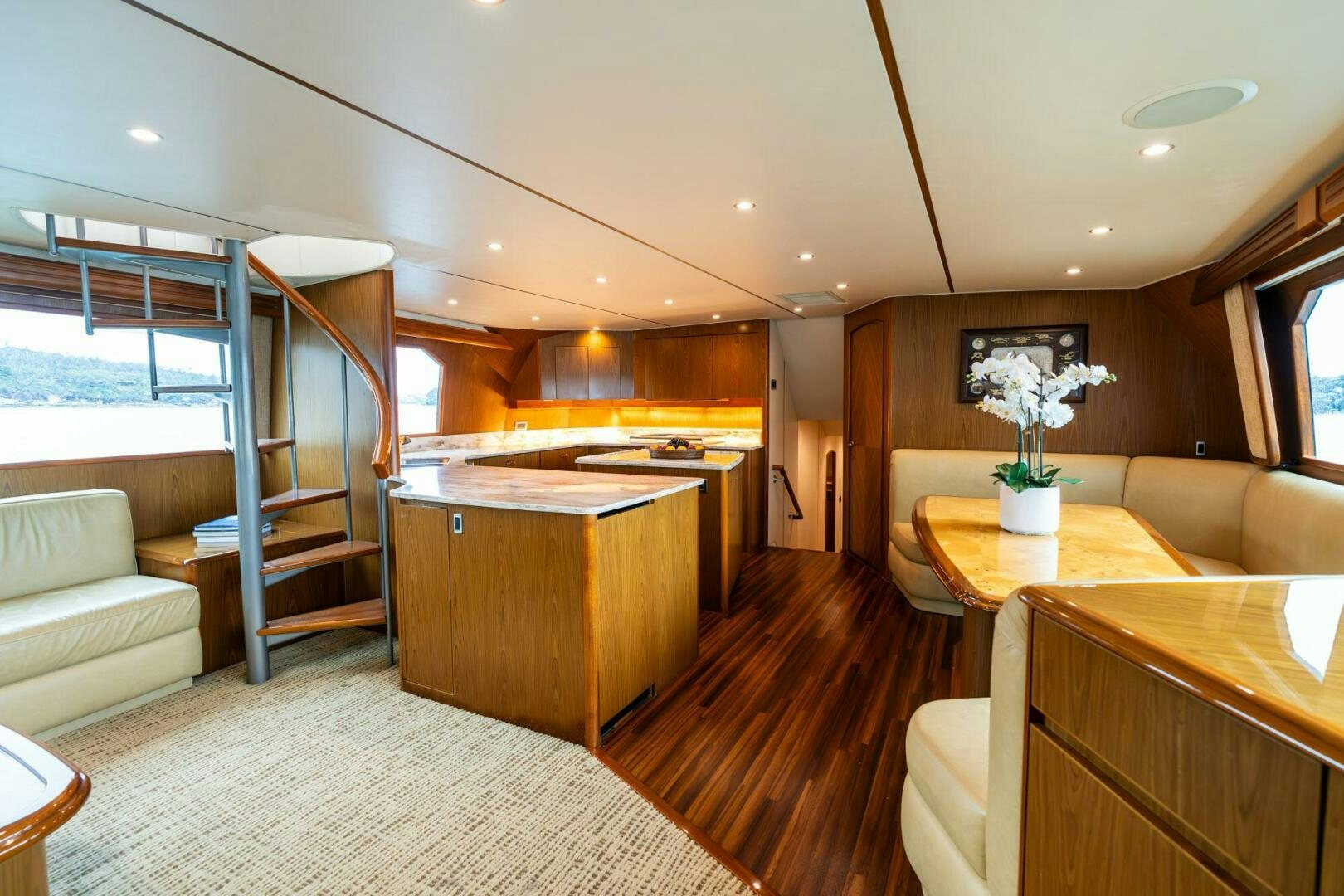 a large kitchen with a sliding glass door aboard LITTLE AUDREY Yacht for Sale