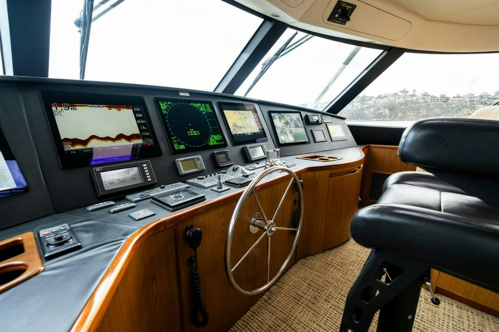 a control room with many monitors aboard LITTLE AUDREY Yacht for Sale