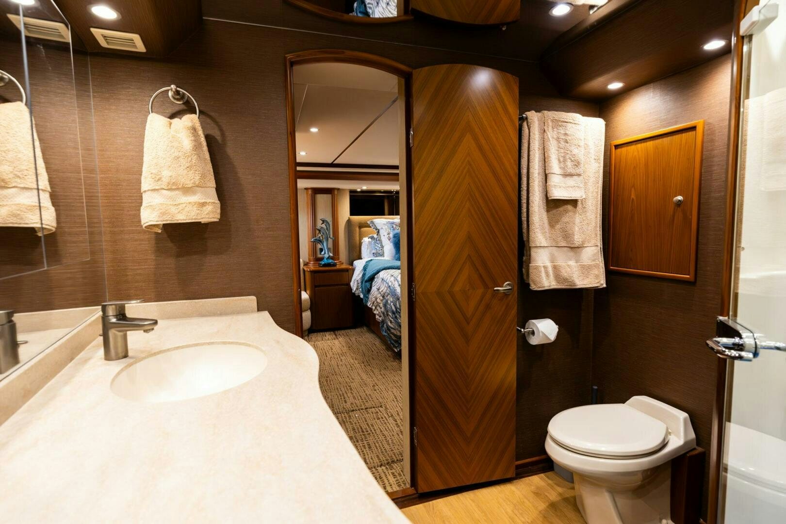 a bathroom with a bathtub and toilet aboard LITTLE AUDREY Yacht for Sale