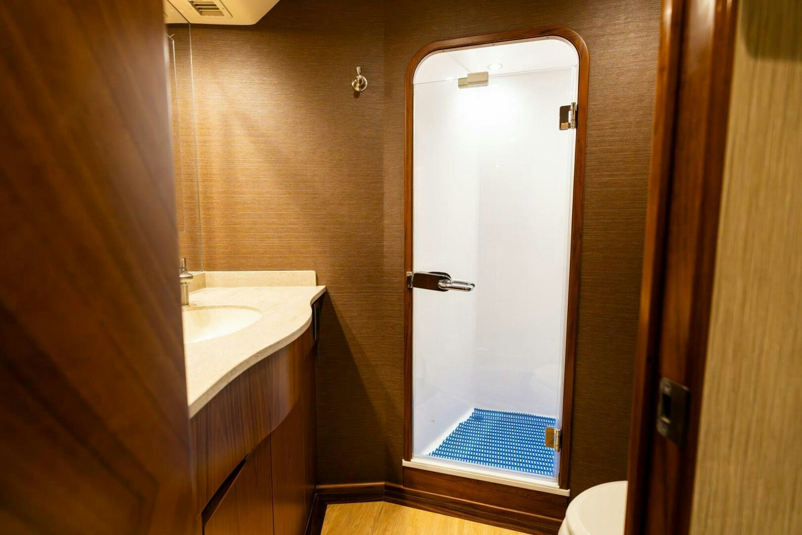 a bathroom with a sink and a toilet aboard LITTLE AUDREY Yacht for Sale