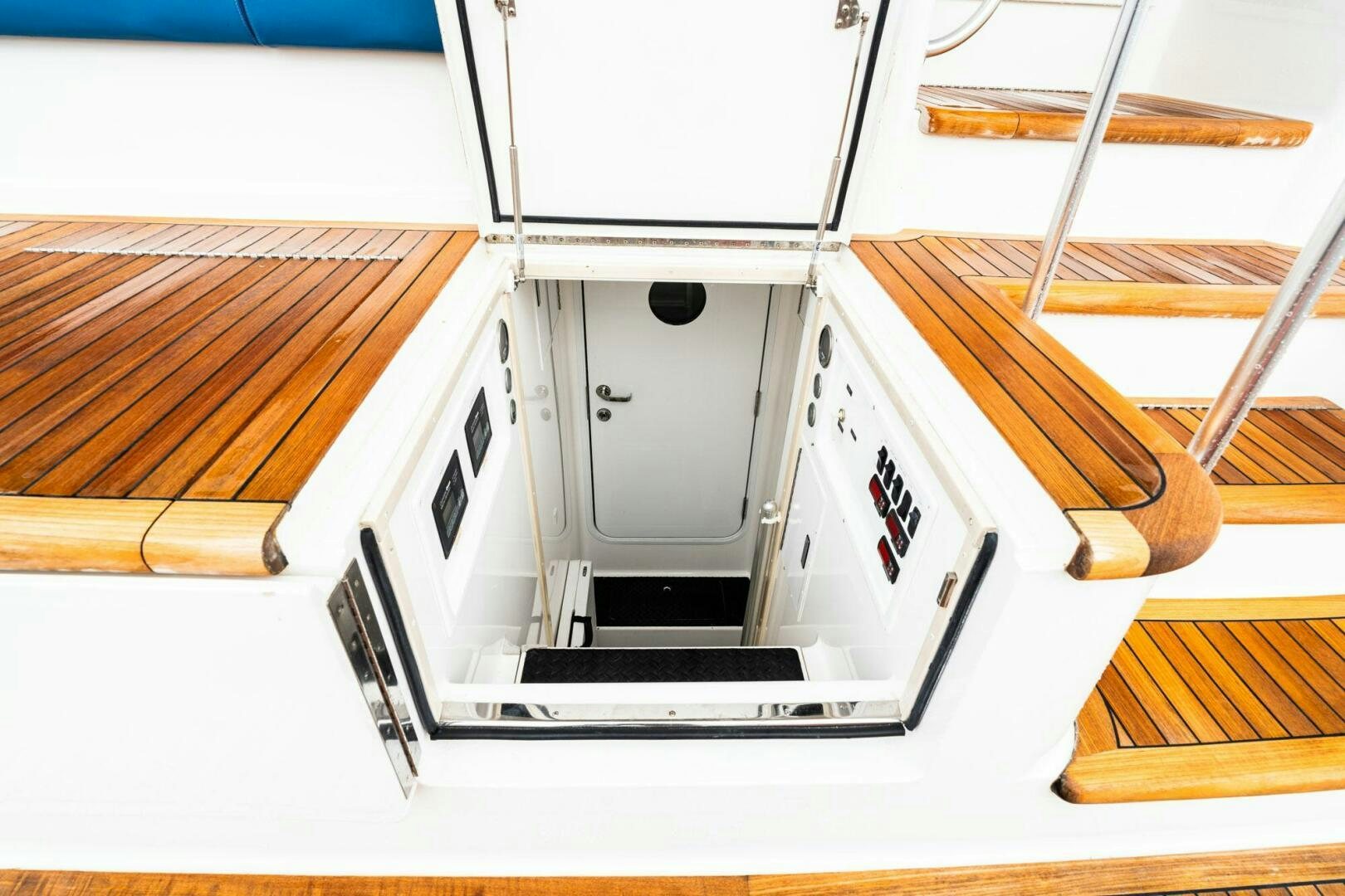 a white machine with a wooden handle aboard LITTLE AUDREY Yacht for Sale