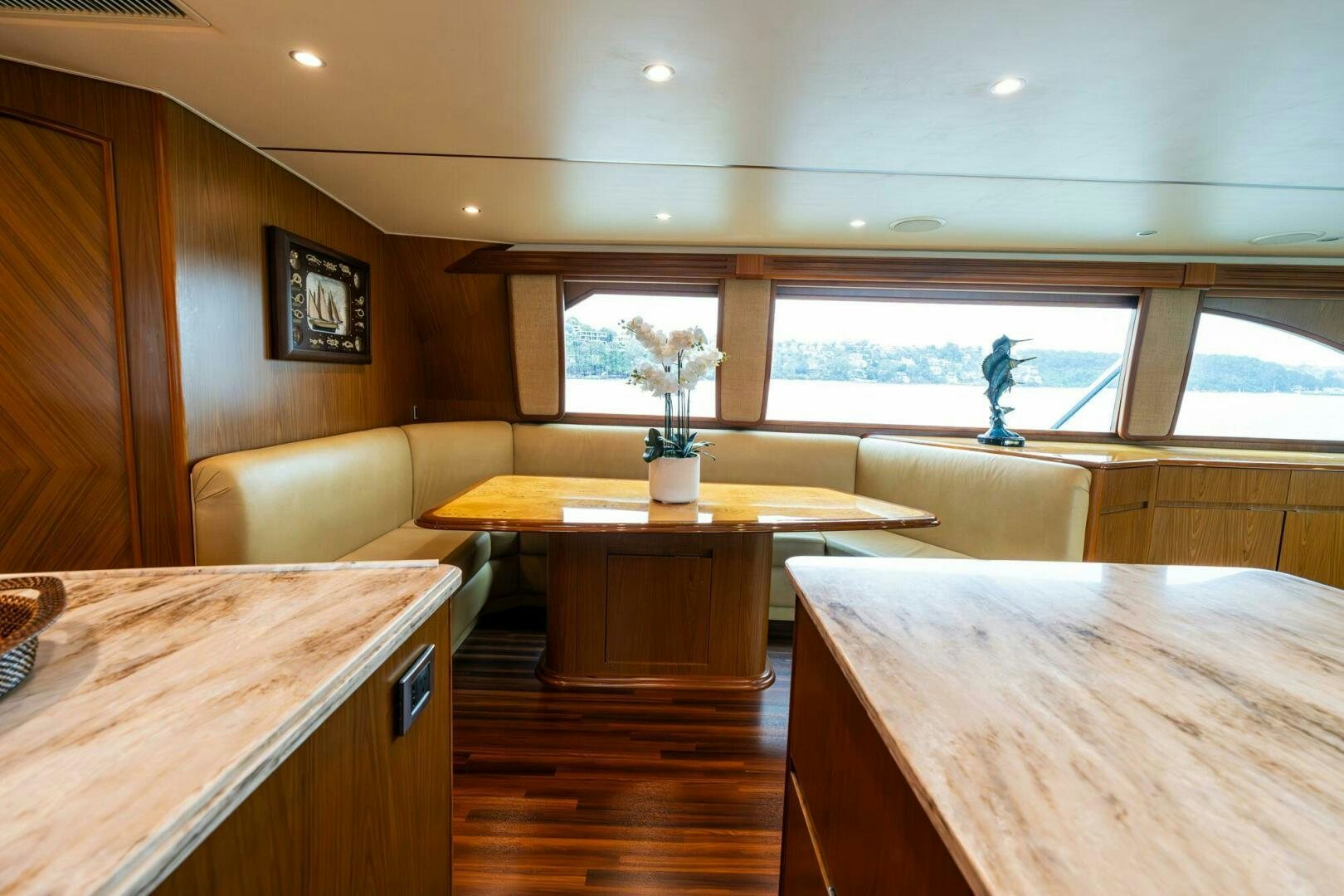 a room with a table and chairs aboard LITTLE AUDREY Yacht for Sale