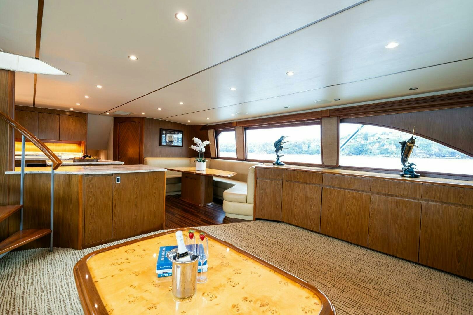 a large room with a table and chairs aboard LITTLE AUDREY Yacht for Sale