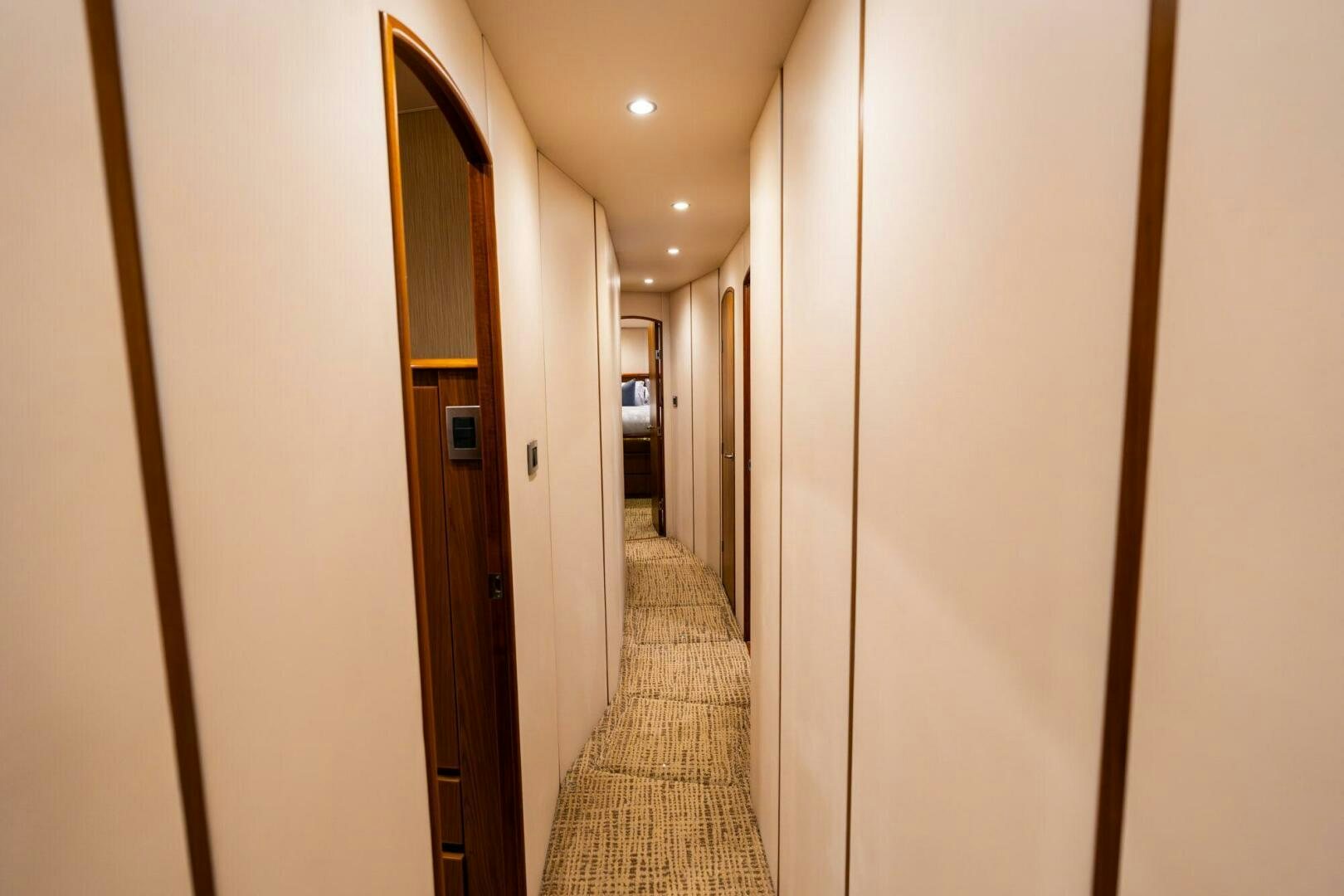a hallway with doors aboard LITTLE AUDREY Yacht for Sale